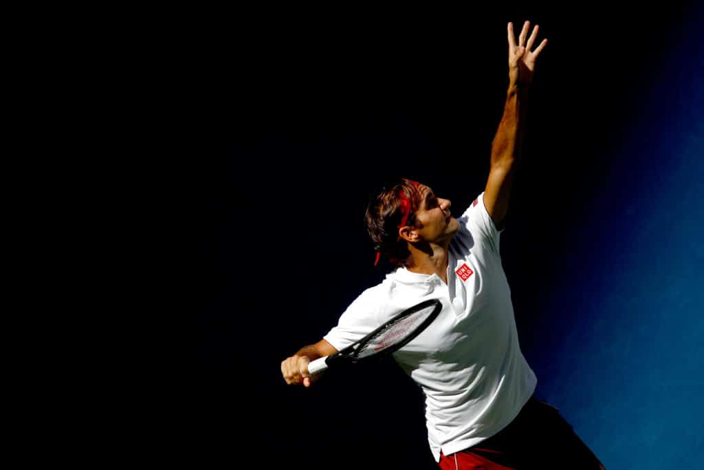 Roger Federer around the net