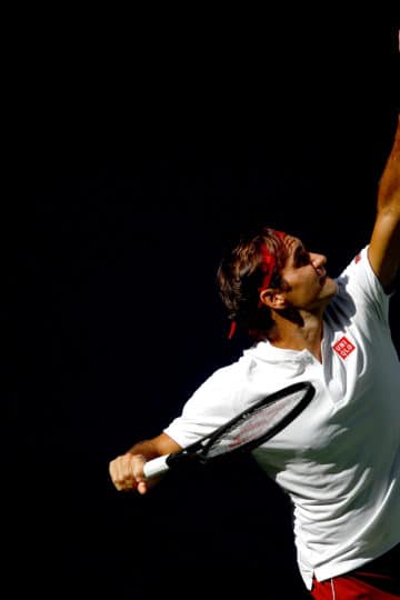 Roger Federer around the net